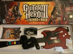 An image of the game, console, or accessory Guitar Hero III Legends of Rock [Wired Guitar Bundle] - (CIB) (Playstation 2)